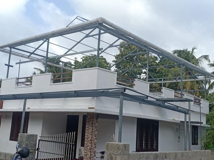 Steel roof truss over a finished home