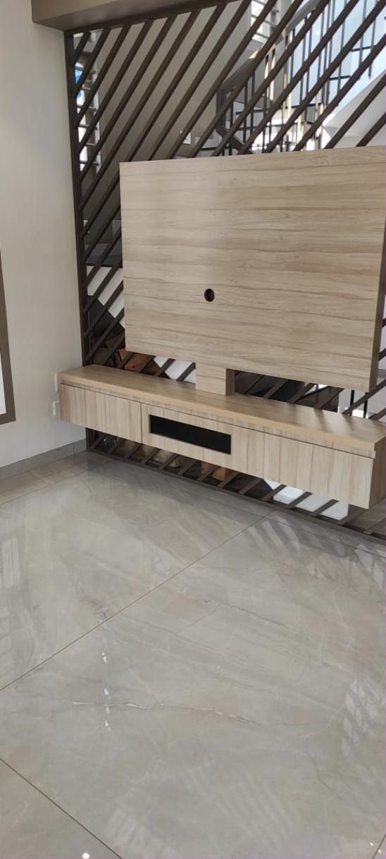 Floating TV unit with slatted screen